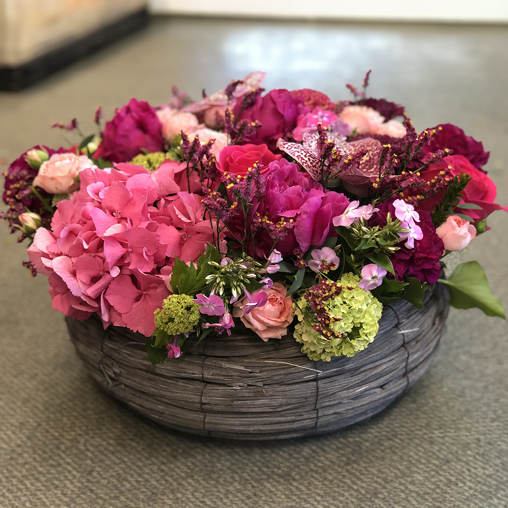 Arrangement floral rond rose fuchsia